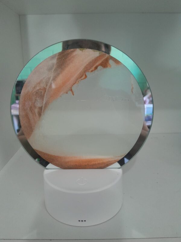 cuadro de arena con luz artístico